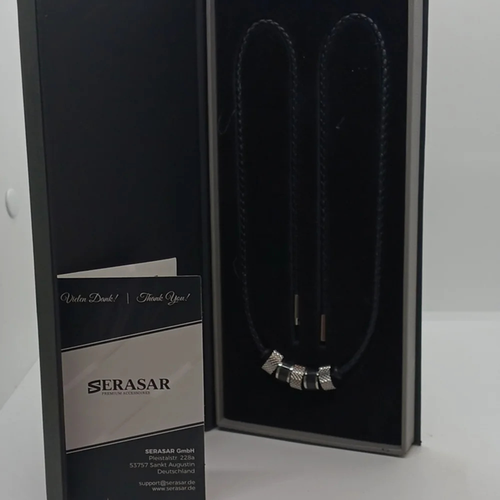 NWT SERASAR MEN'S BOLO BLACK AND SILVER